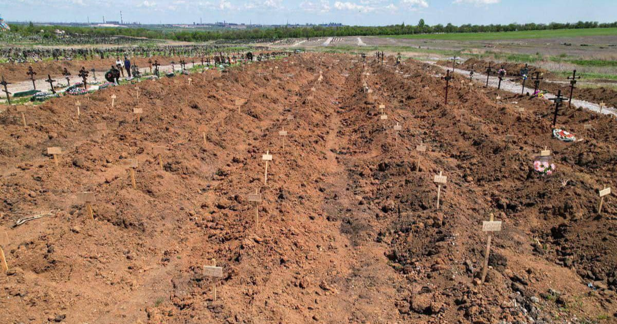 Near the temporarily occupied Mariupol, Russians continue to bury people in a mass grave at the Starokrymskyi Cemetery